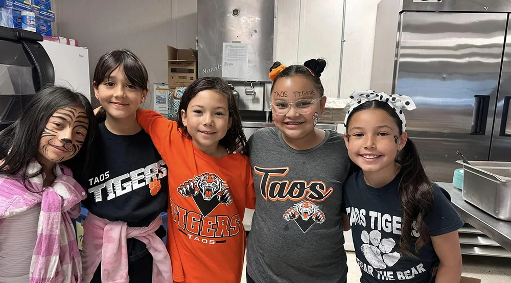 Tisa Kids posing together for a photo